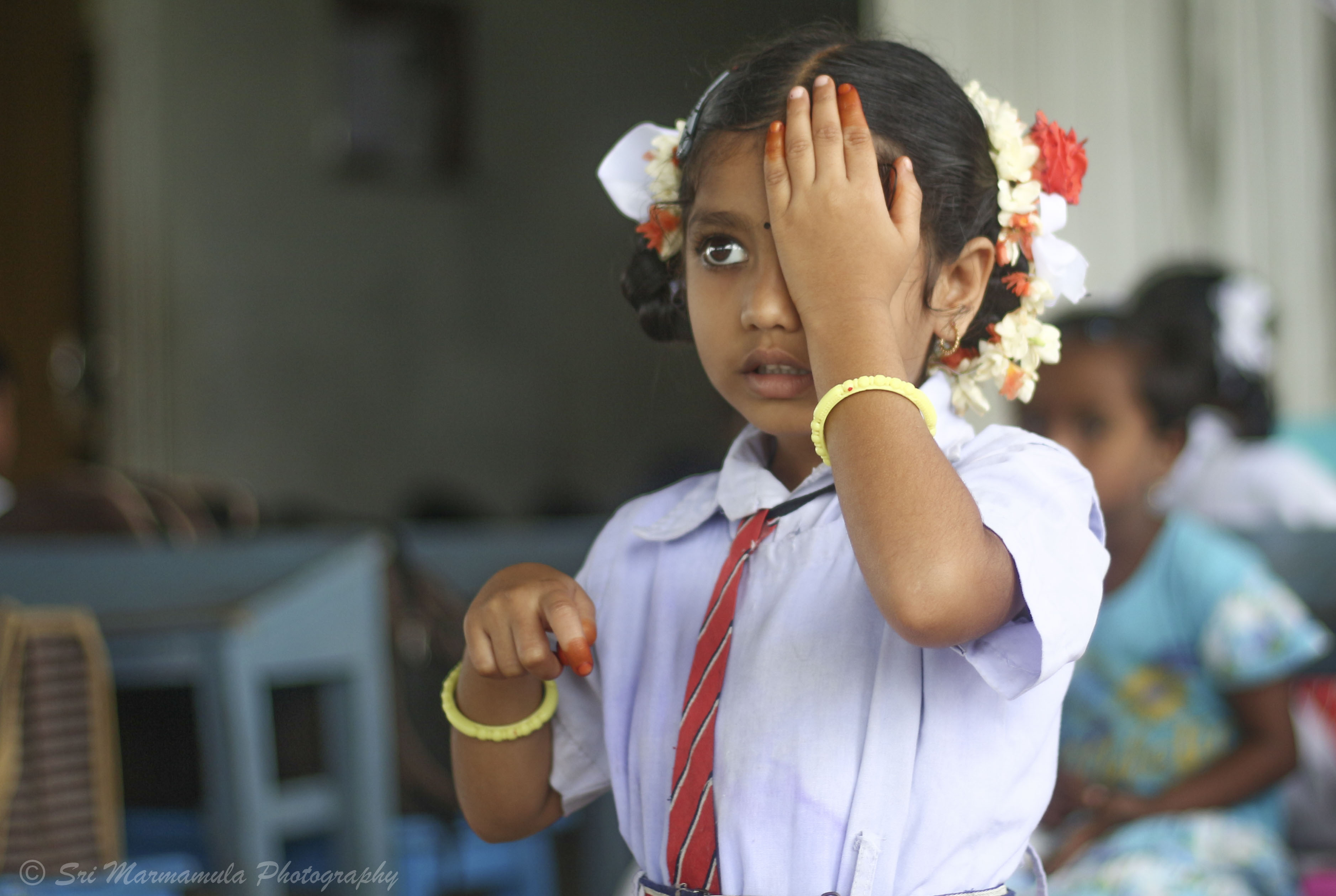 A little girl being screened at her school. INDIA. (c) SRI MARMAMULA/ LVPEI