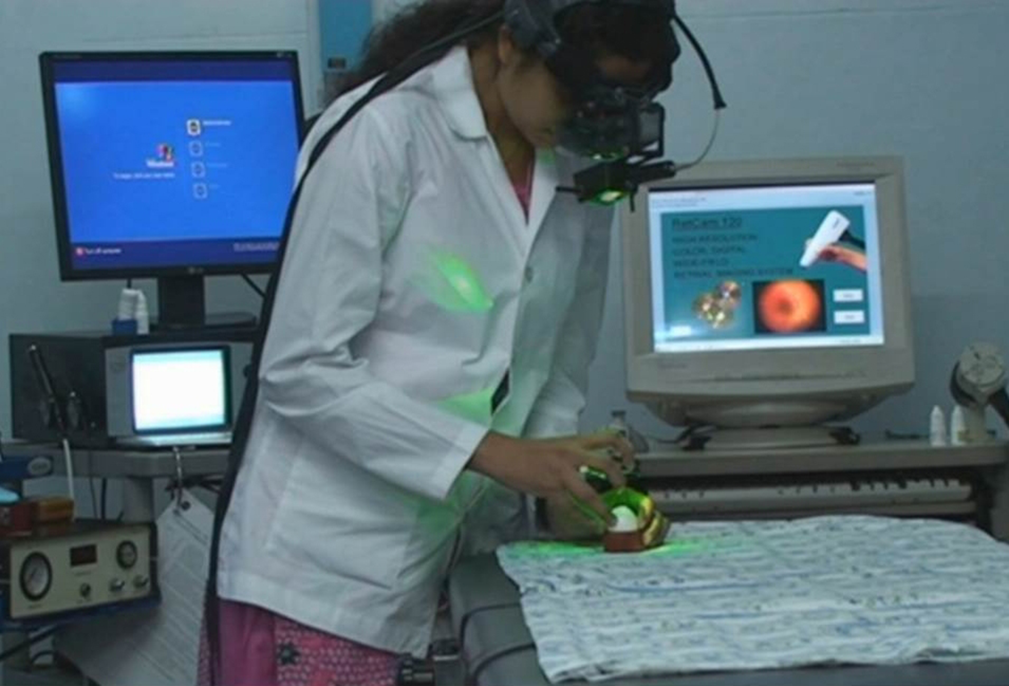 Figure 1 ROP trainee practising indirect laser on RetiEye. (c)ARAVIND EYE CARE SYSTEMS