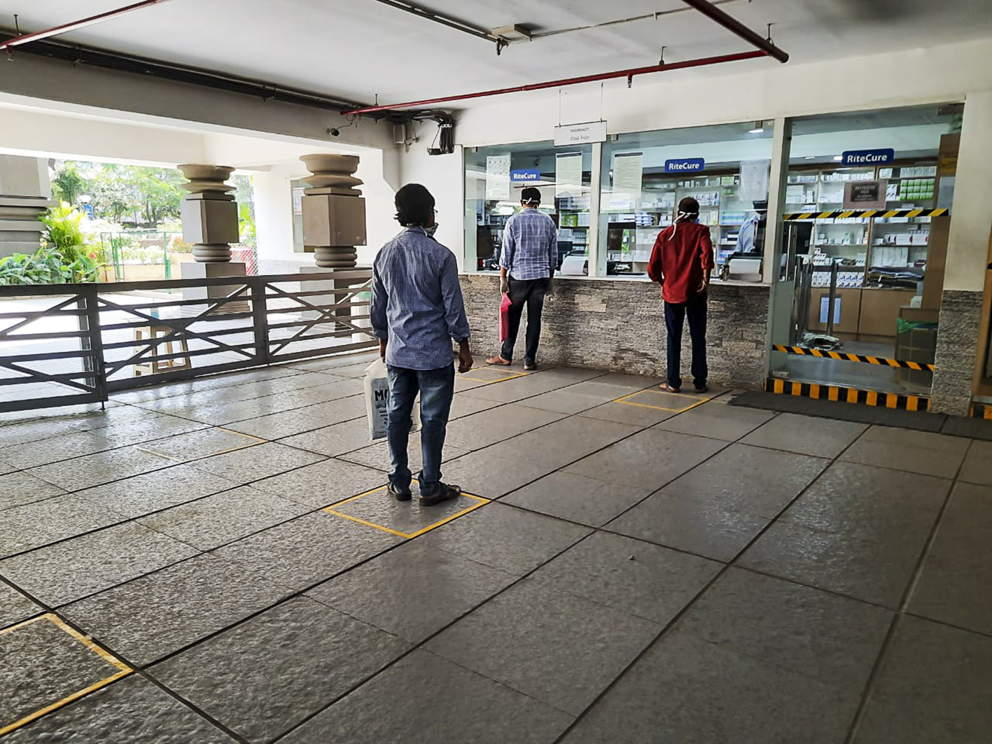 Markings on the floor facilitating adequate distancing between patients.