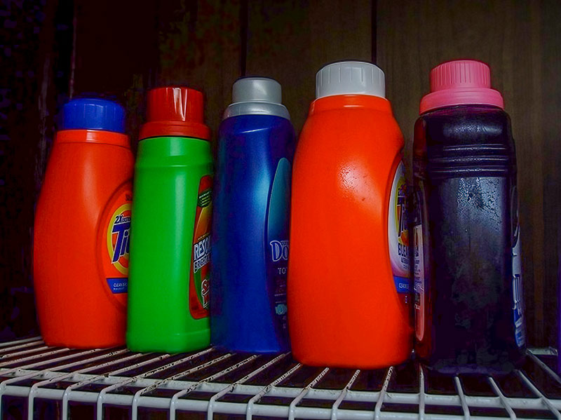 Figure 5 Sharps containers can be created using everyday items such as sturdy plastic detergent bottles. Photo Credit: Jon Seidman CC BY 2.0” class=