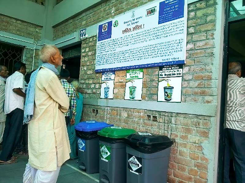 Bins are accompanied by posters explaining good waste segregation practices. Photo Credit: Sanjay Kumar Singh, Nepal” class=