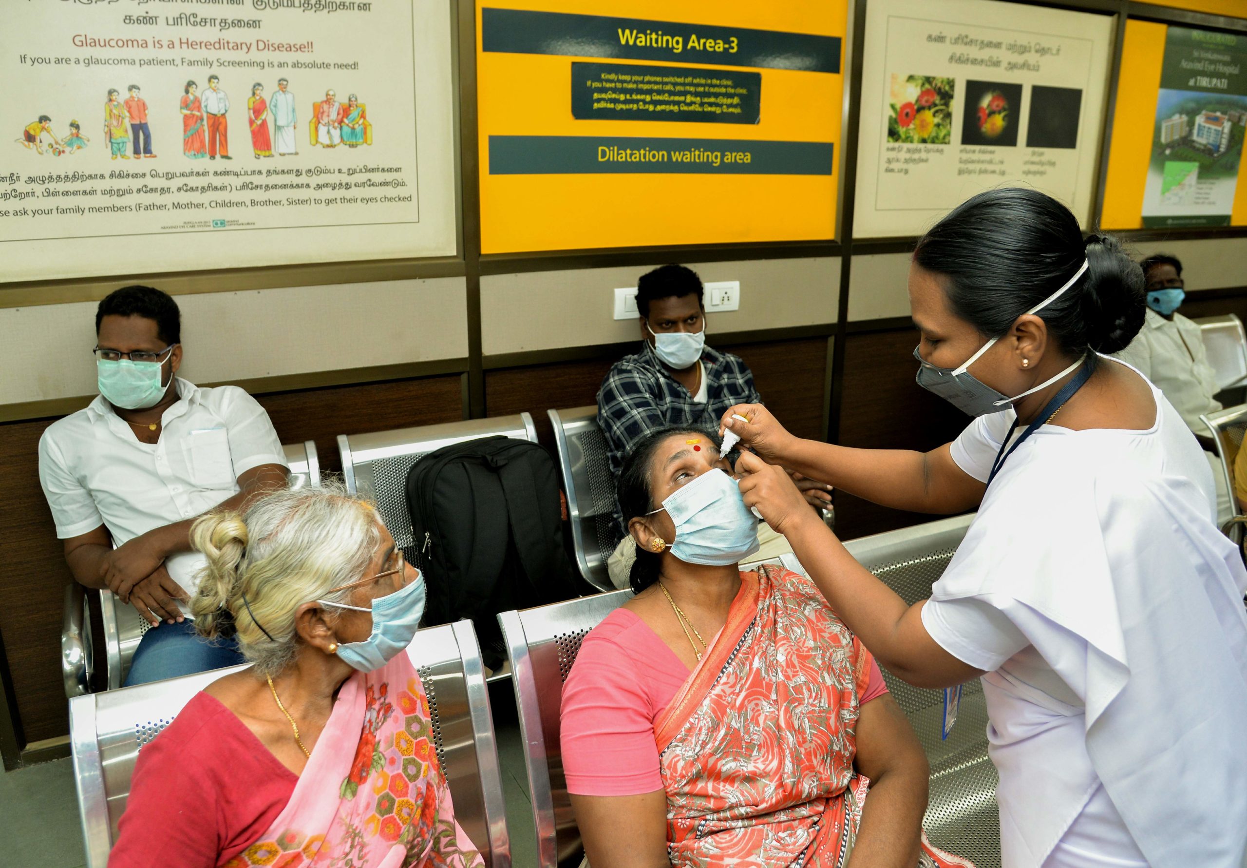 Teaching patient with glaucoma how to instill eye drops, Madurai, India. Photo Credit: ARAVIND EYE CARE SYSTEM